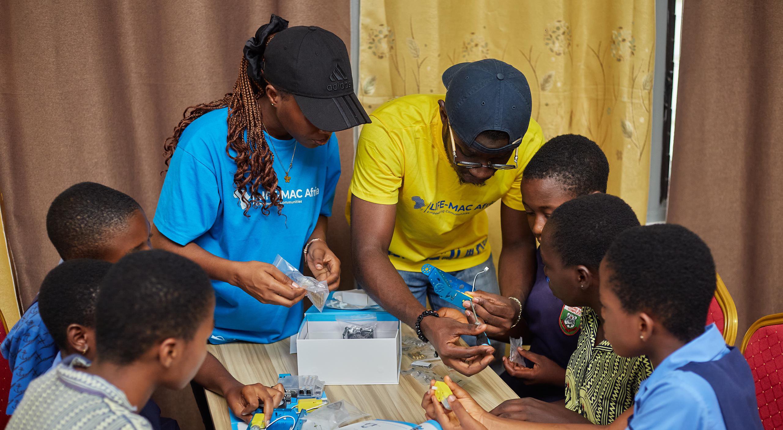 African students working with STEM kits